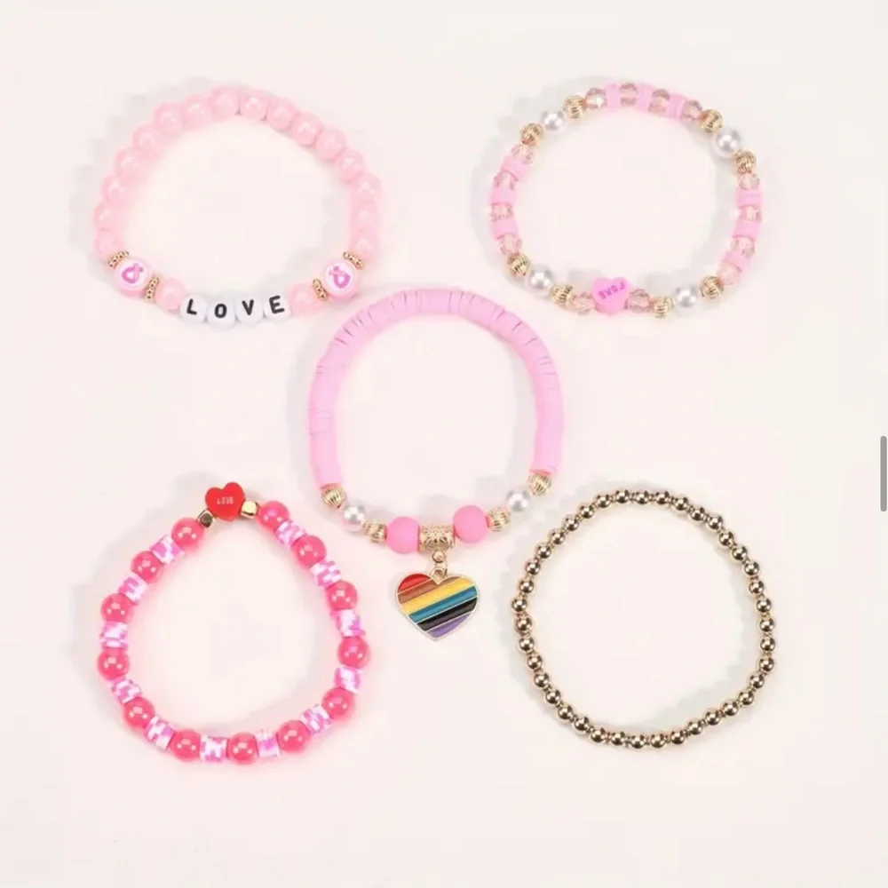 NWT! Fashion Jewelry 5 pink and gold beaded stackable stretch bracelets